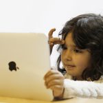 child-using-ipad