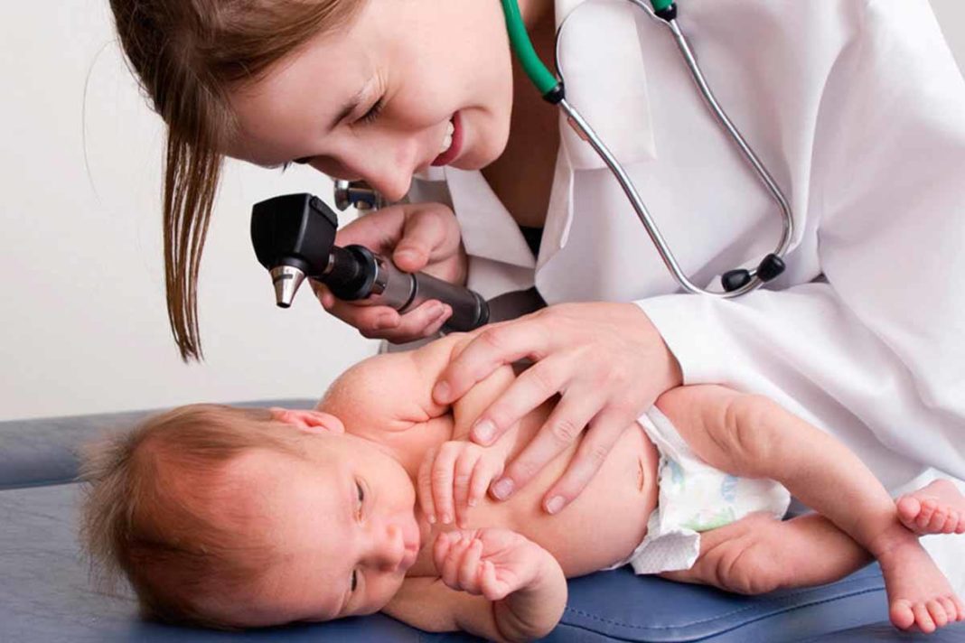 doctor-checking-new-born-baby
